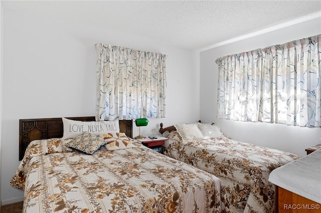 bedroom with a textured ceiling