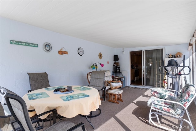 view of carpeted dining room