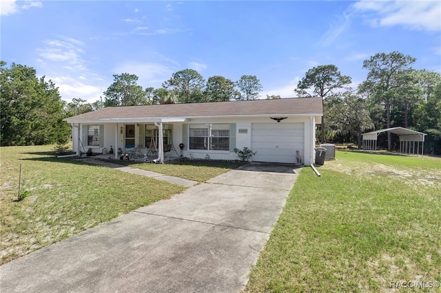 ranch-style home featuring covered porch, central air condition unit, a garage, and a front yard