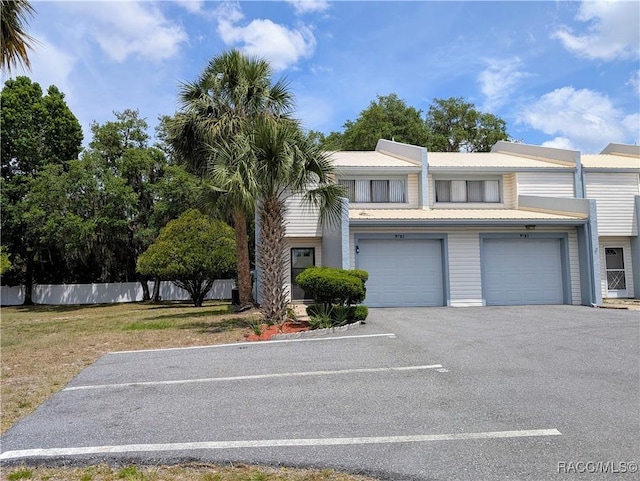 9781 E Goldfinch Ln, Inverness, FL 34450 - multi unit property featuring an attached garage