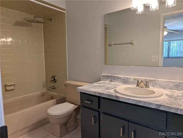 9781 E Goldfinch Ln, Inverness, FL 34450 - full bathroom featuring tile patterned floors, toilet, tub / shower combination, vanity, and ceiling fan