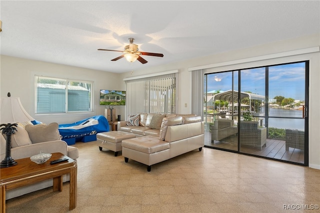 living room featuring ceiling fan