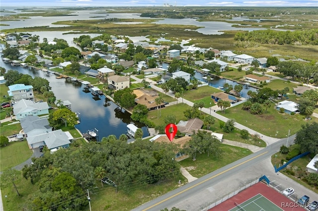 drone / aerial view with a water view