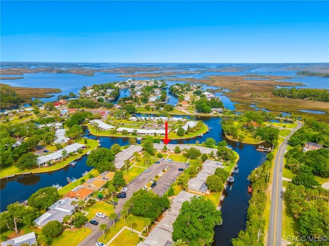 drone / aerial view featuring a water view