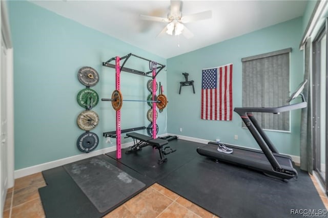 workout area with tile patterned flooring and ceiling fan