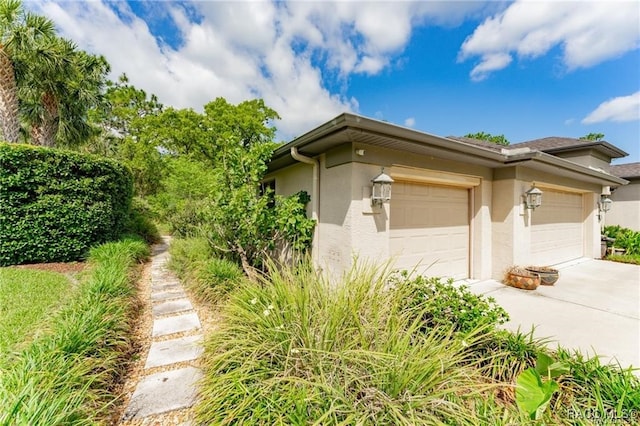 view of home's exterior with a garage