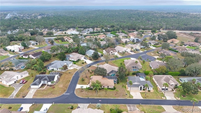 bird's eye view with a residential view and a view of trees