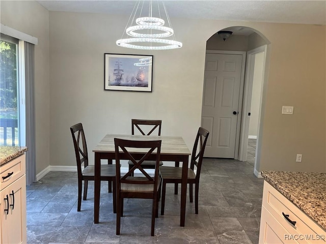 dining area with a chandelier