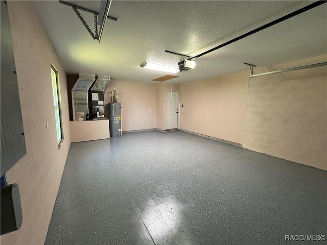 garage with heating unit, a garage door opener, and water heater