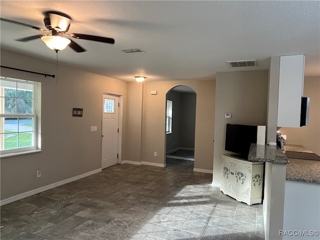 foyer with ceiling fan