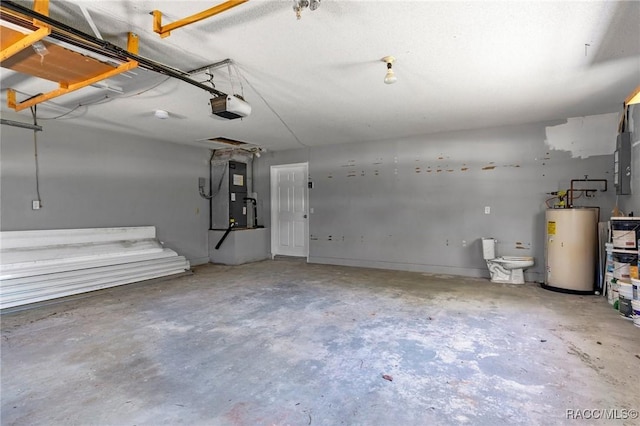 garage featuring gas water heater, heating unit, and a garage door opener