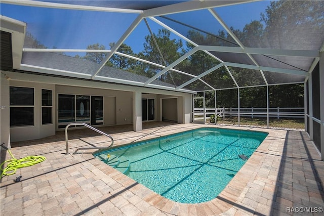 5079 W Pinto Loop, Beverly Hills, FL 34465 - outdoor pool with a patio, glass enclosure, and fence