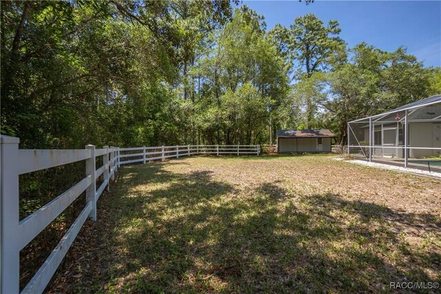 5079 W Pinto Loop, Beverly Hills, FL 34465 - view of yard featuring a lanai