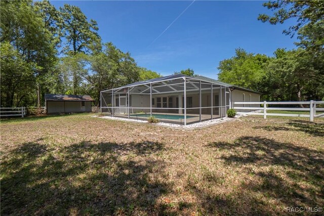 5079 W Pinto Loop, Beverly Hills, FL 34465 - view of yard featuring a lanai and an outdoor pool