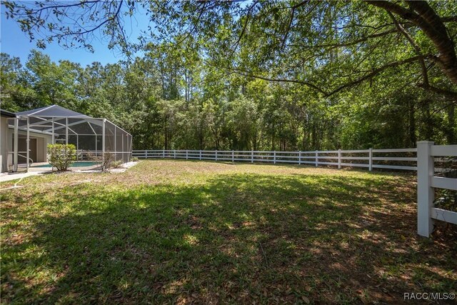 5079 W Pinto Loop, Beverly Hills, FL 34465 - view of yard featuring a lanai