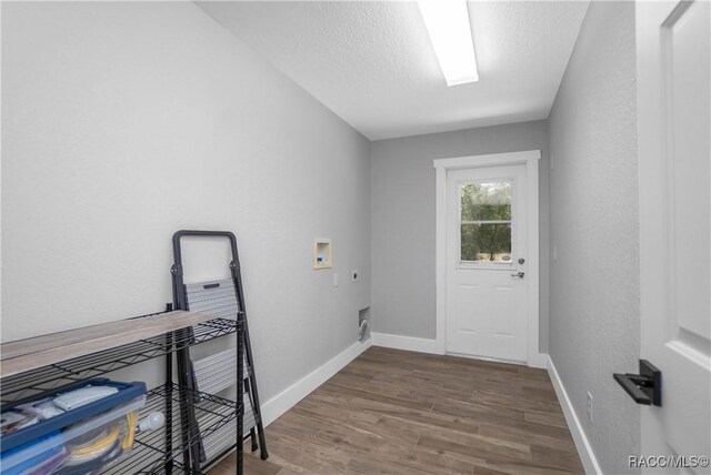 5079 W Pinto Loop, Beverly Hills, FL 34465 - laundry area with electric dryer hookup, hookup for a washing machine, wood finished floors, and baseboards