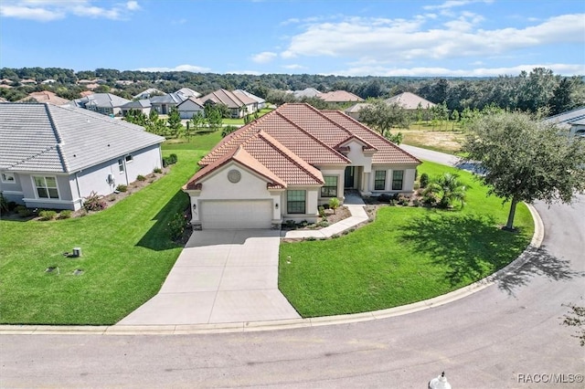 2071 N Buttonwood Loop, Hernando, FL 34442 - view of front of home with a garage, driveway, stucco siding, and a front yard