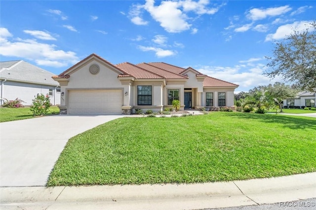 2071 N Buttonwood Loop, Hernando, FL 34442 - mediterranean / spanish-style home with stucco siding, a front lawn, a garage, concrete driveway, and a tile roof