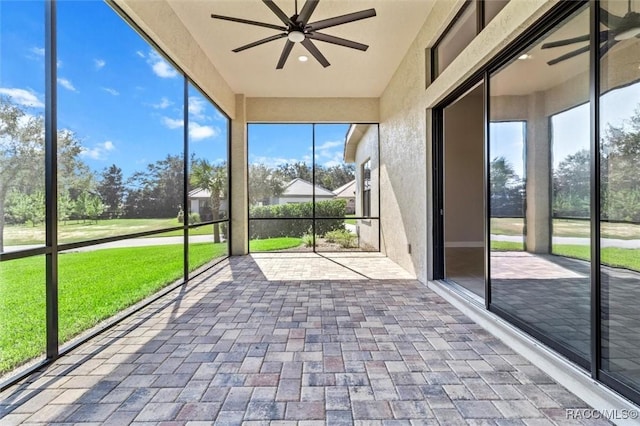 2071 N Buttonwood Loop, Hernando, FL 34442 - unfurnished sunroom with a ceiling fan