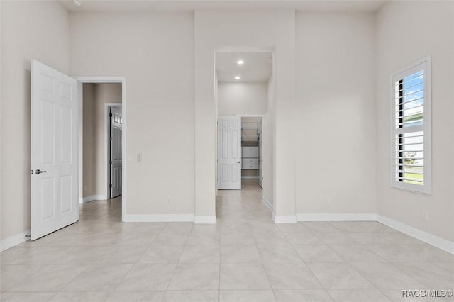 2071 N Buttonwood Loop, Hernando, FL 34442 - empty room featuring a towering ceiling and light tile patterned floors