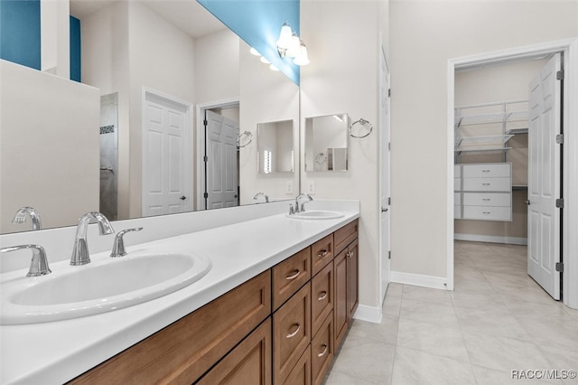 bathroom featuring tile patterned floors and vanity