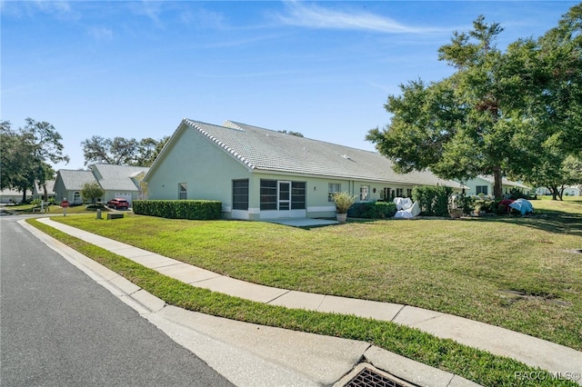 ranch-style house with a front yard