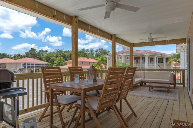 10200 W Waterlander Loop, Homosassa, FL 34448 - deck with a ceiling fan, outdoor dining area, and a residential view