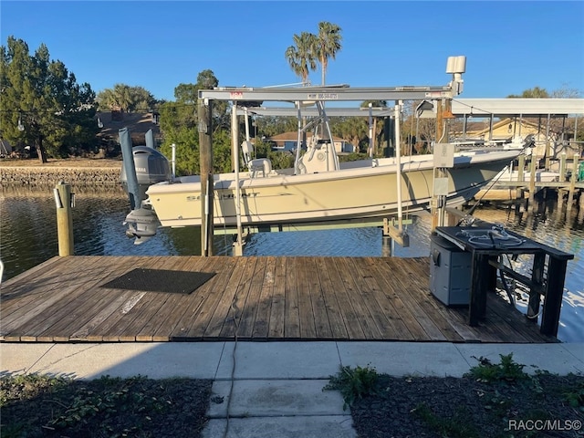 view of dock featuring a water view