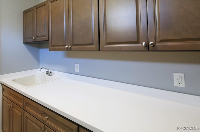 laundry area featuring sink