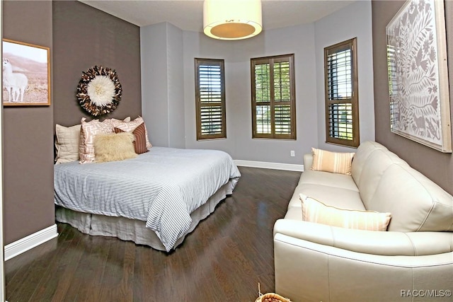 bedroom featuring dark wood-type flooring