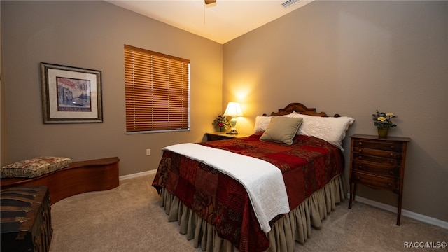 carpeted bedroom featuring vaulted ceiling