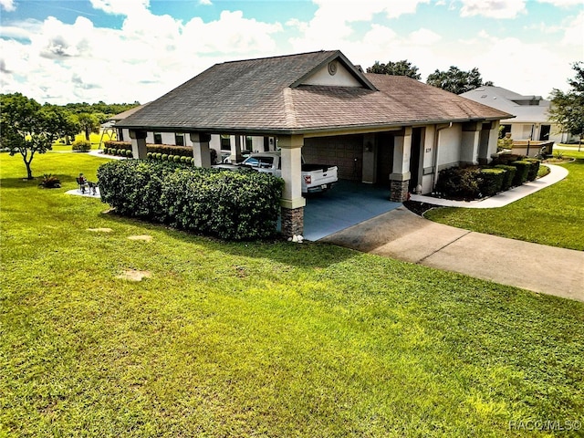 view of front of house featuring a front lawn and a carport