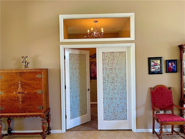 interior space featuring a chandelier