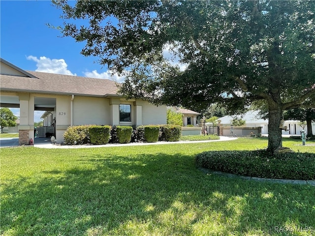 view of property exterior with a yard