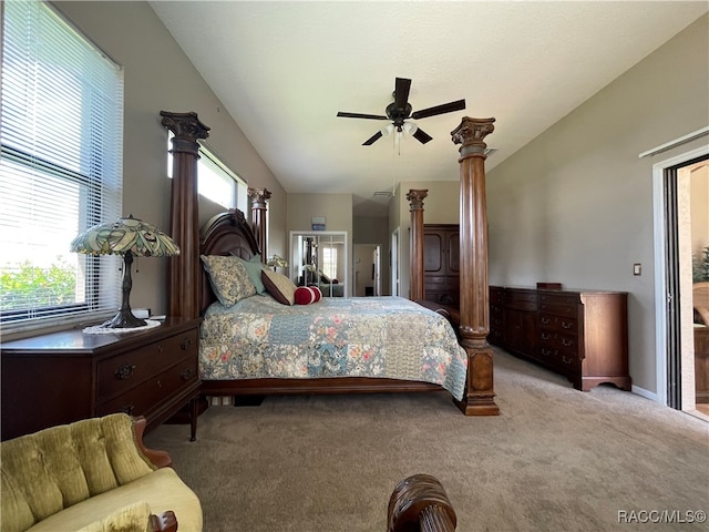 carpeted bedroom featuring ceiling fan and vaulted ceiling