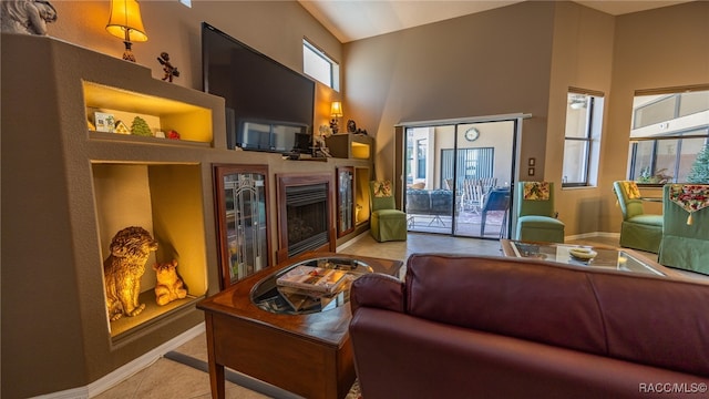 living room with a towering ceiling