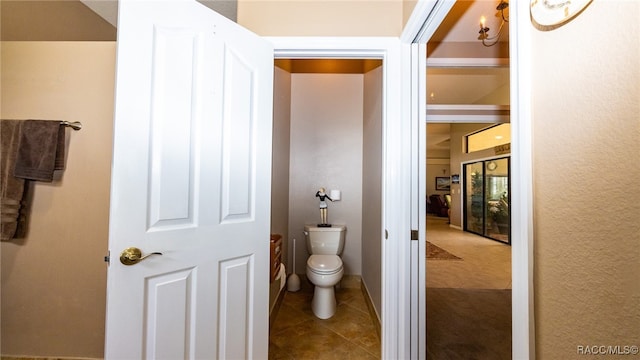 bathroom with tile patterned floors and toilet