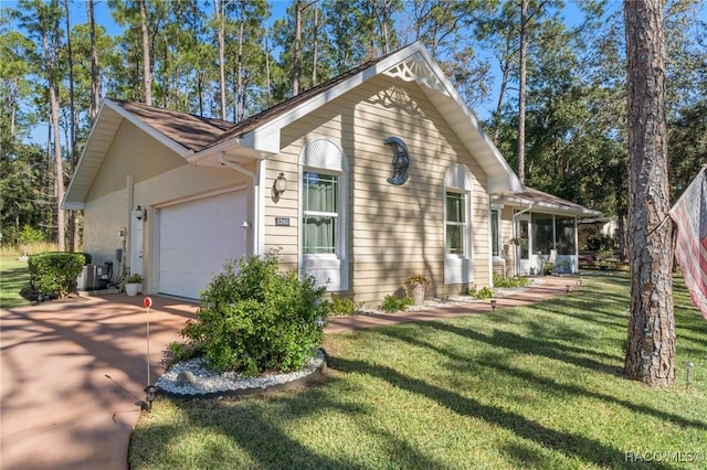 view of front facade with a front lawn and a garage