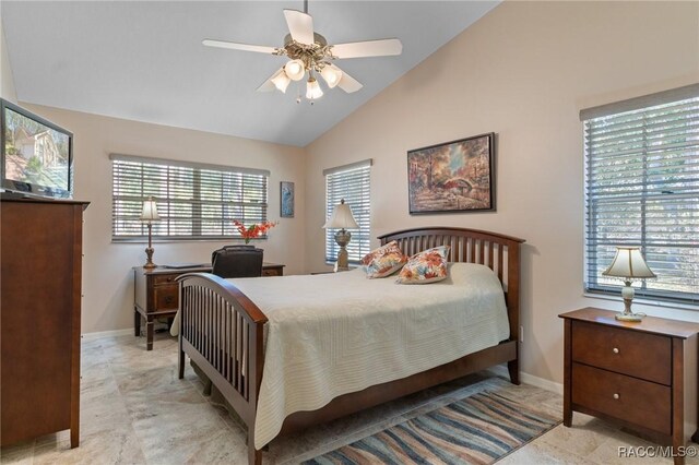 bedroom featuring ceiling fan and lofted ceiling