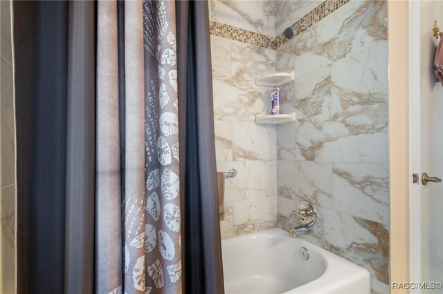 bathroom featuring  shower combination