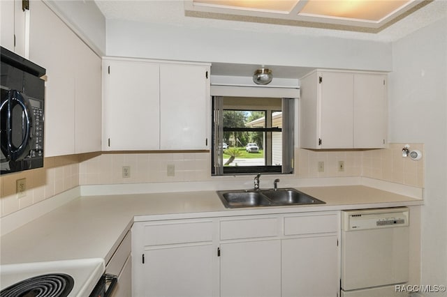 kitchen with white dishwasher, sink, a textured ceiling, tasteful backsplash, and white cabinetry