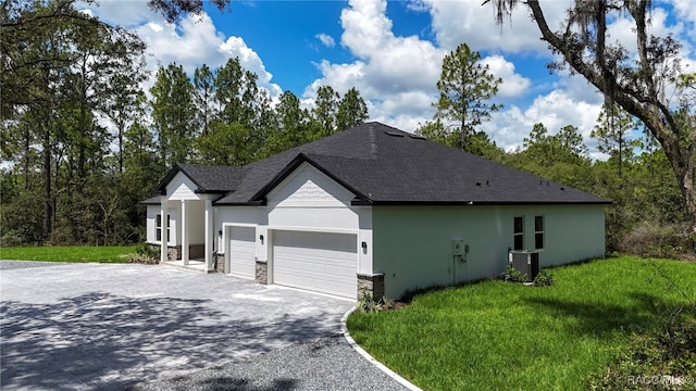 7024 N Fountainhead Dr, Citrus Springs, FL 34433 - view of side of property featuring decorative driveway, an attached garage, a yard, stucco siding, and stone siding