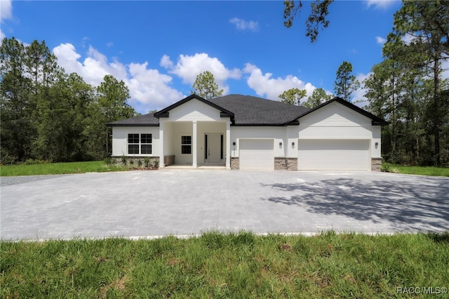 7024 N Fountainhead Dr, Citrus Springs, FL 34433 - ranch-style house featuring decorative driveway, stone siding, an attached garage, and stucco siding
