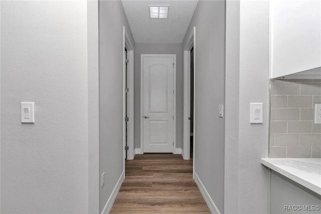 7024 N Fountainhead Dr, Citrus Springs, FL 34433 - hall featuring light wood finished floors and baseboards