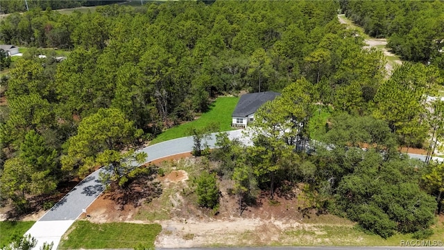 7024 N Fountainhead Dr, Citrus Springs, FL 34433 - drone / aerial view of a heavily wooded area