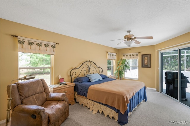 2617 E Newhaven St, Inverness, FL 34453 - carpeted bedroom featuring access to outside, ceiling fan, and baseboards