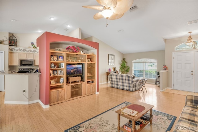2617 E Newhaven St, Inverness, FL 34453 - living room with light wood finished floors, vaulted ceiling, ceiling fan, baseboards, and recessed lighting