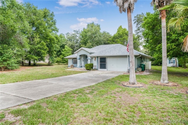 2617 E Newhaven St, Inverness, FL 34453 - single story home with driveway, a garage, a front yard, and a shingled roof