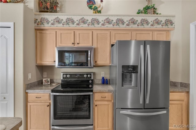 2617 E Newhaven St, Inverness, FL 34453 - kitchen with appliances with stainless steel finishes, light brown cabinets, and light countertops