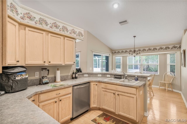 2617 E Newhaven St, Inverness, FL 34453 - kitchen featuring dishwasher, light brown cabinetry, a sink, a peninsula, and light wood-style floors